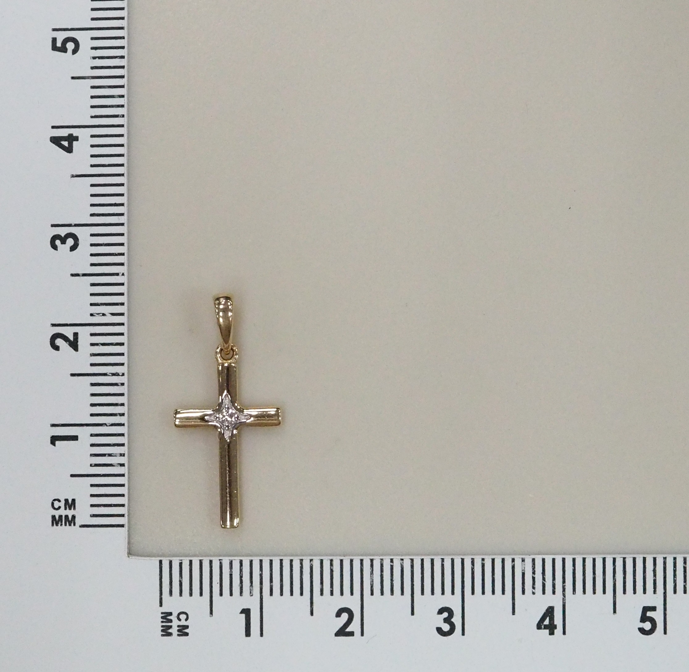 Подвеска-крест из золота с бриллиантом